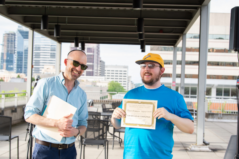 Natan and Student at Graduation